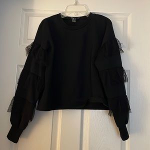 Black Crewneck Sweatshirt with lace sleeve details.